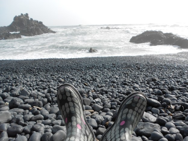 Boots and cobble beach