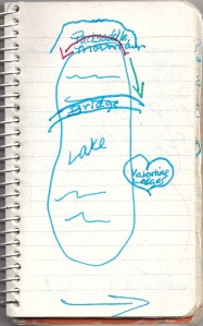 hand-drawn image of a lake on lined notebook paper